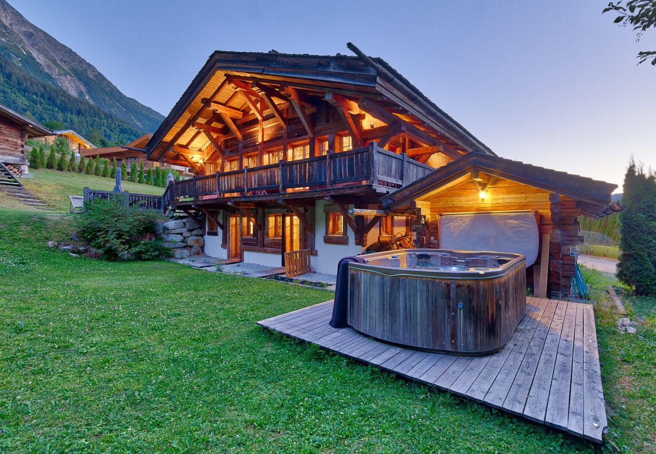 Beautiful chalet with stunning back drop with jacuzzi